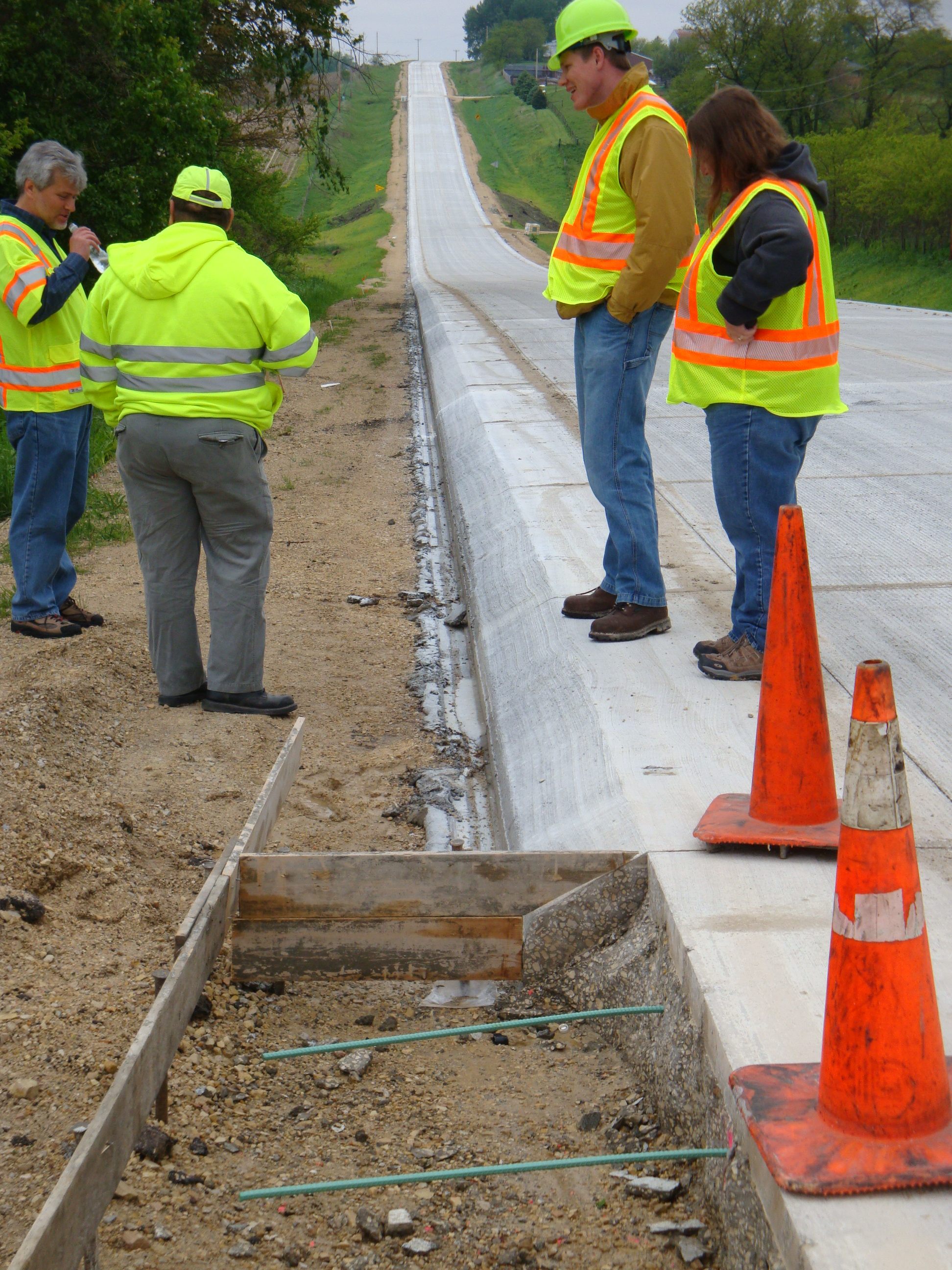Pavement construction using a concrete overlay in Iowa.